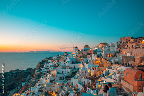 Great evening view of Oia, Santorini island. Wonderful summer sunset on the famous travel destination background. Tranquil vacation tourism © icemanphotos