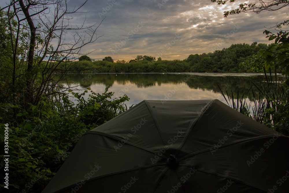 Carp fishing at dusk on a shropshire lake
