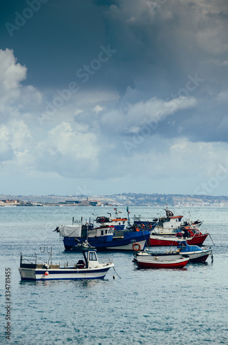 Fishing boats floating in the fish port of Cascais - Portugal © Alexandre Rotenberg