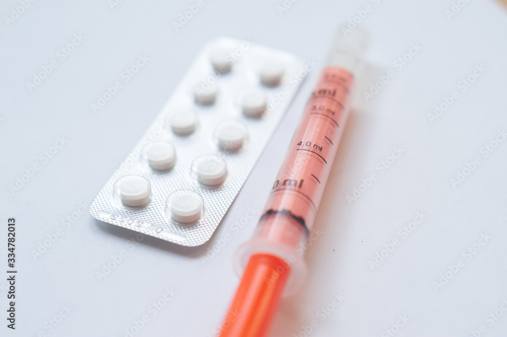 Medical concept. Drugs and syringe. Copy space. Top view Medical concept. Drugs and syringe. Copy space. Top view