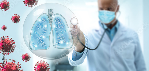 Foto Doctor pulmonologist take care of the human lungs against the backdrop of flying COVID-19 viruses