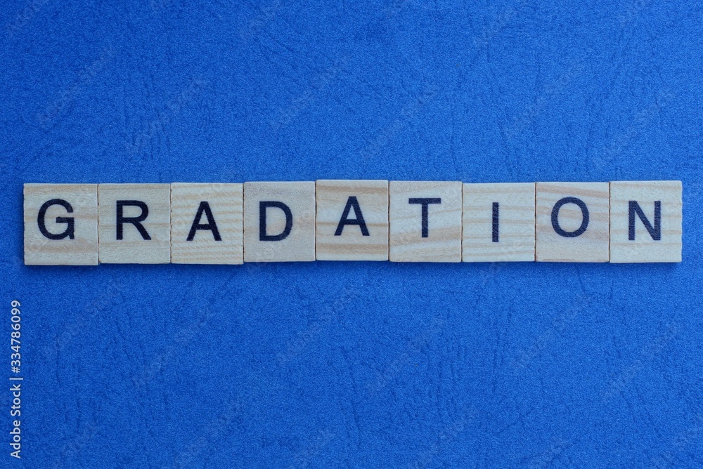 word gradation made from gray letters lies on a blue background word gradation made from gray letters lies on a blue background