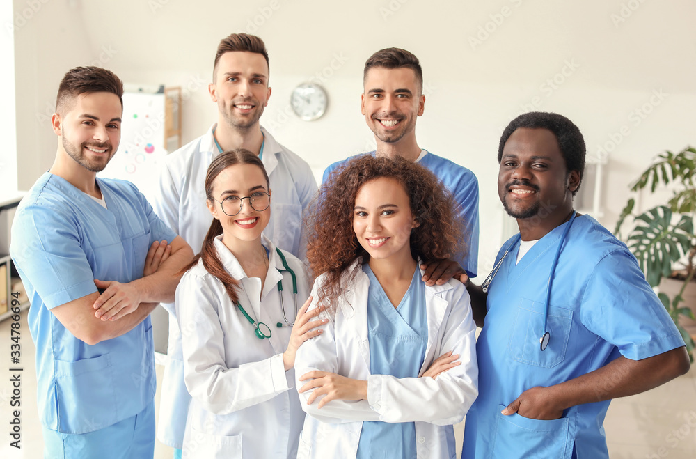 Group of doctors in clinic. Unity concept Group of doctors in clinic. Unity concept