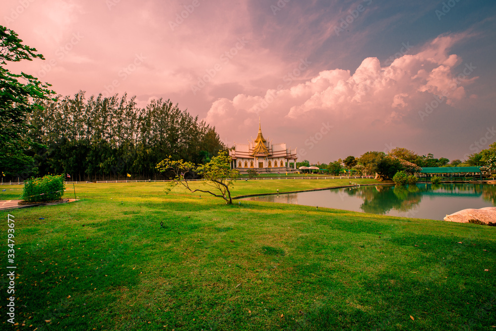 Naklejka premium Wallpaper Wat Lan Boon Mahawihan Somdet Phra Buddhacharn(Wat Non Kum)is the beauty of the church that reflects the surface of the water, popular tourists come to make merit and take a public photo