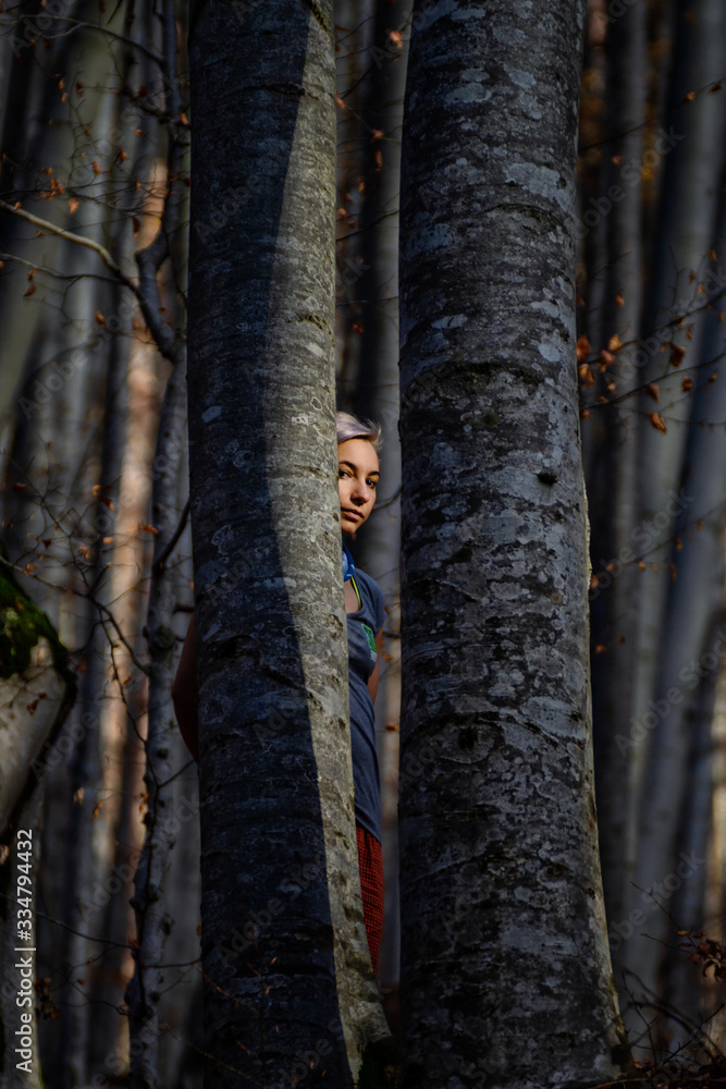 Young girl in the forest in autumn Young girl in the forest in autumn