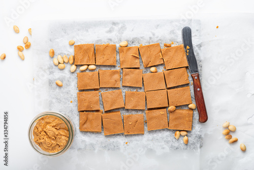 Homemade peanut butter fudge cut in squares, top view