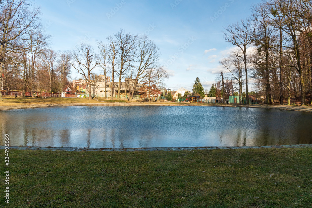 Fototapeta premium Chuchelna village scenery with pond in Czech republic