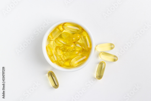 fish oil capsules on white background