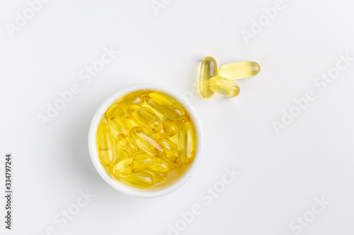 fish oil pills isolated on white background