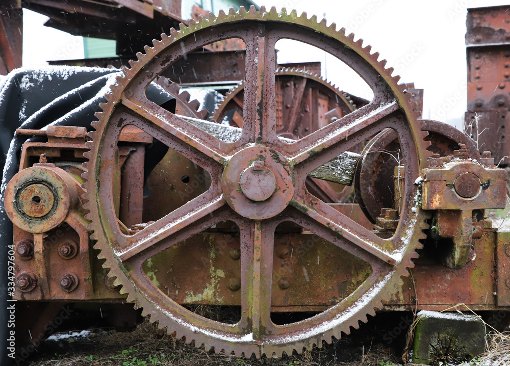 Old rusty gear used on a train turn table.