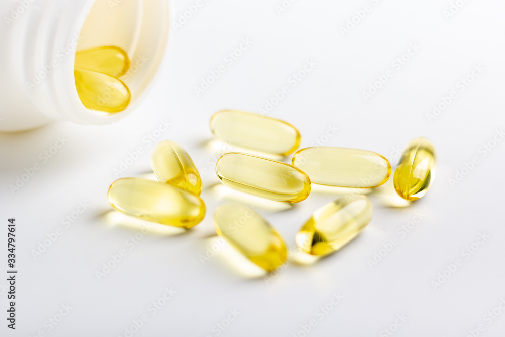 fish oil capsules on white background fish oil capsules on white background