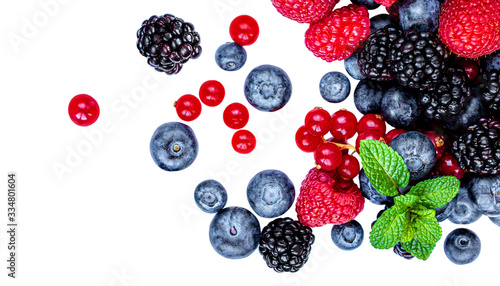 Sweet mix berries isolated on white background, top view. Berry border frame. Flat lay.