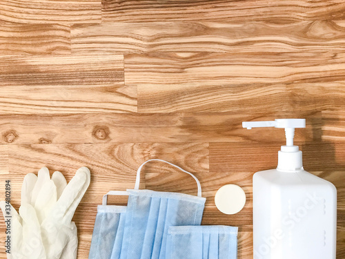 Pair of latex medical gloves, medical masks, sanitizer gel for hand hygiene, remedies, soap, disinfector. Coronavirus prevention