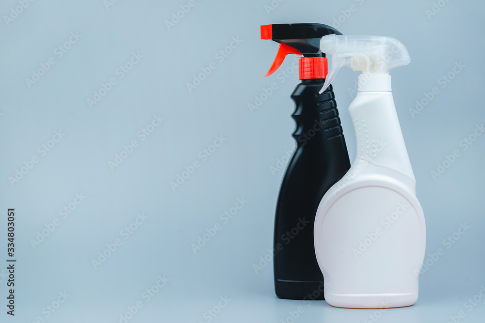 A set of cleaning and disinfection products on a gray background. Close-up with space for text. Prevention of coronavirus A set of cleaning and disinfection products on a gray background. Close-up with space for text. Prevention of coronavirus