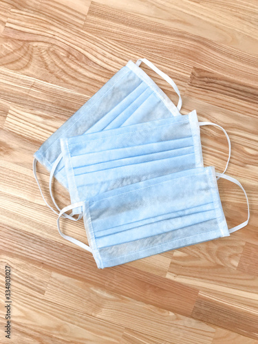 Pair of latex medical gloves, medical masks, sanitizer gel for hand hygiene, remedies, soap, disinfector. Coronavirus prevention