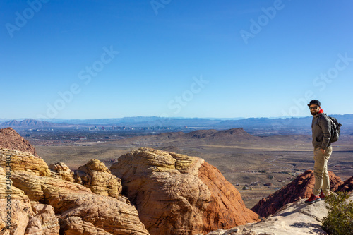 Las Vegas view smiling man tourist backpacker red rock mountains landscape Red Rock Canyon National Conservation Area Nevada’s Mojave Desert