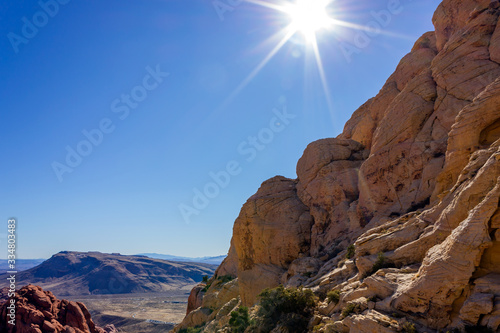 sun flares in the desert landscape Red Rock Canyon National Conservation Area Nevada’s Mojave