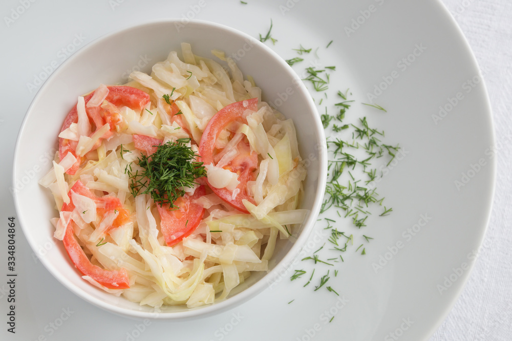 cabbage and tomato salad with mayo and dill