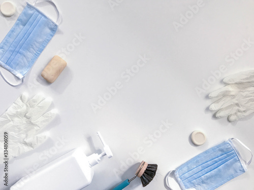 Pair of latex medical gloves, medical masks, sanitizer gel for hand hygiene, remedies, soap, disinfector. Coronavirus prevention