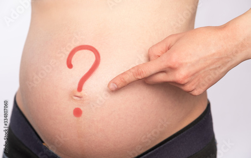 Wallpaper Mural Question mark on the belly of a pregnant woman Torontodigital.ca
