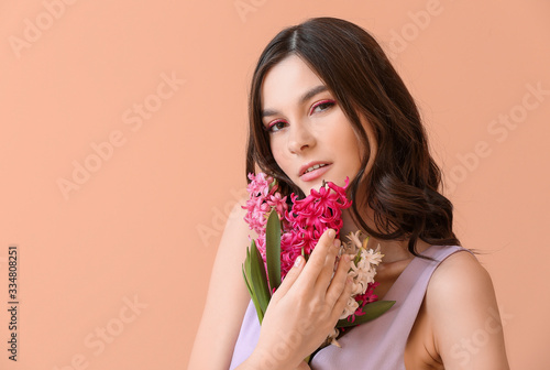 Beautiful young woman with ...