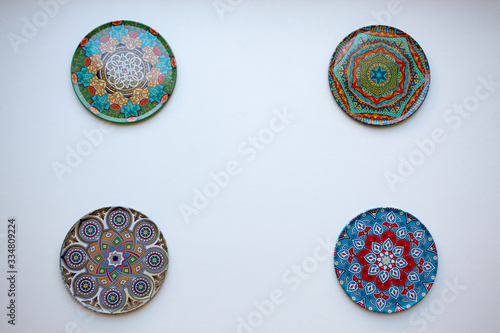 Multi-colored plates on a white background