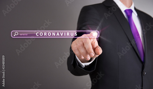 Business man touch screen concept - Coronavirus