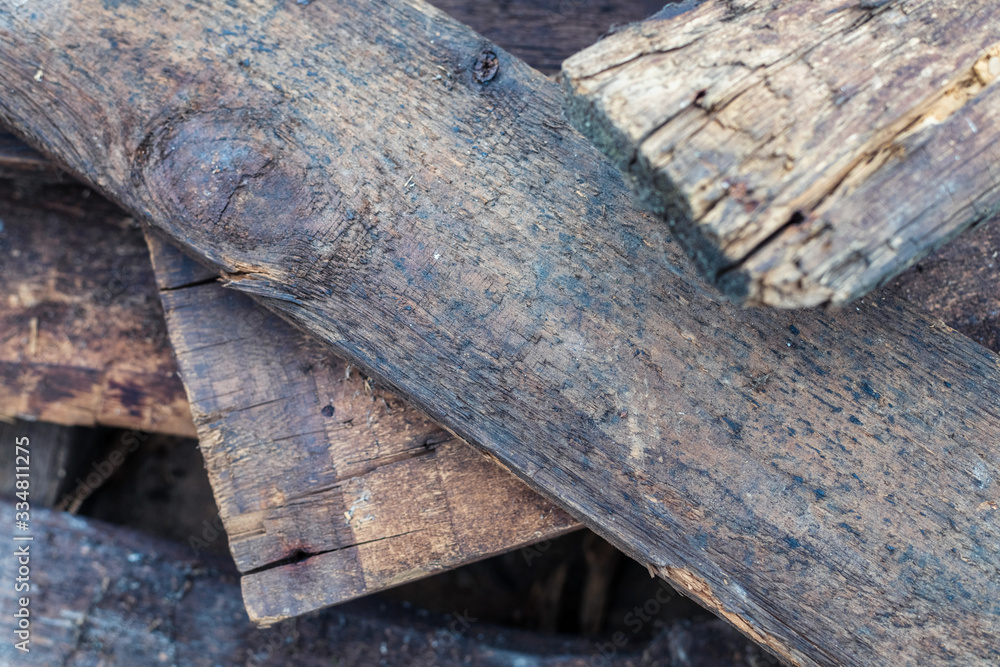 Old wooden boards after the collapsed house Old wooden boards after the collapsed house