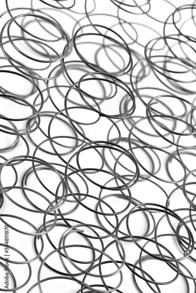Vertical closeup top view of steel springs Vertical closeup top view of steel springs