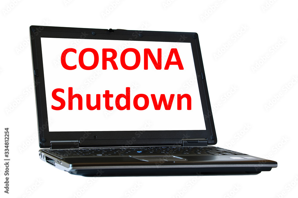 Corona shutdown in red letters written on notebook screen Corona shutdown in red letters written on notebook screen