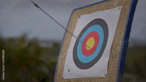 Archery, arrow hits target. Shot in slow-motion.