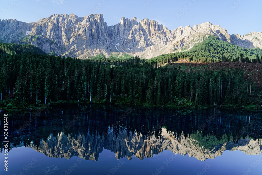 Dolomites mountains at Carezza lake at Alto Adige