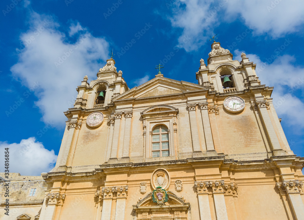 Close up view of the main church Mdina metropolitan Cathedral. No people on the square. Malta island