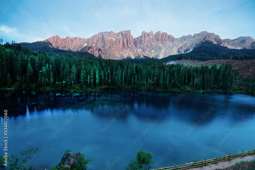 Dolomites mountains on Carezza lake in Alto Adige