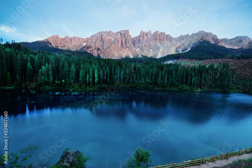 Fototapeta Naklejka Na Ścianę i Meble -  Dolomites mountains on Carezza lake in Alto Adige