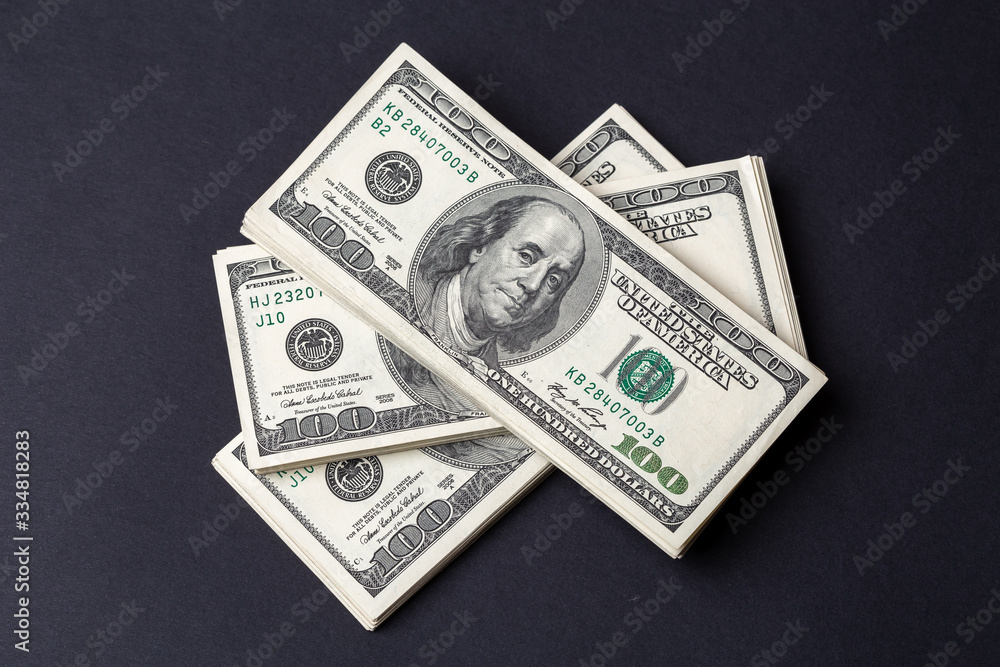 Cash of hundred dollar bills, dollar background. Cash of hundred dollar bills, dollar background.