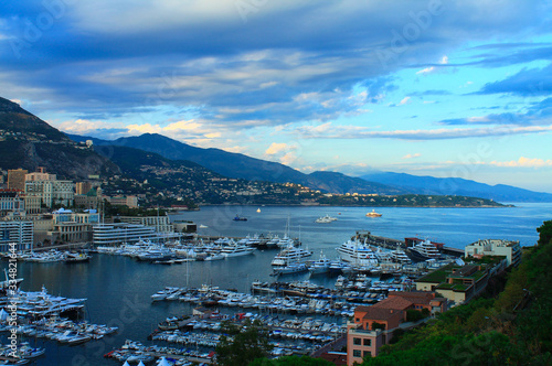 Principality of Monaco. Beautiful panoramic view of Monaco. View of residential buildings and a large port with luxury yachts.