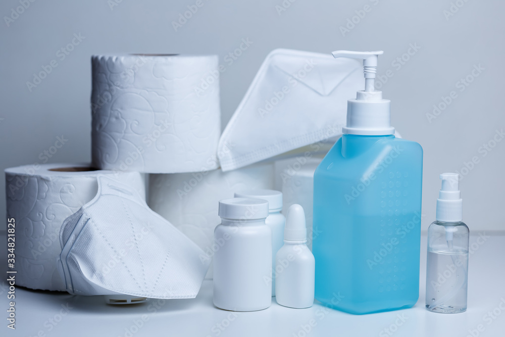 Hand sanitizer and face masks on store shelf hospital supplies for corona virus Hand sanitizer and face masks on store shelf hospital supplies for corona virus