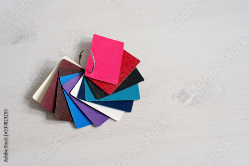 Colorful genuine leather fashion samples, modern shops, industry concept. palette catalog with color leather samples. Cover design. © Tasha Sinchuk