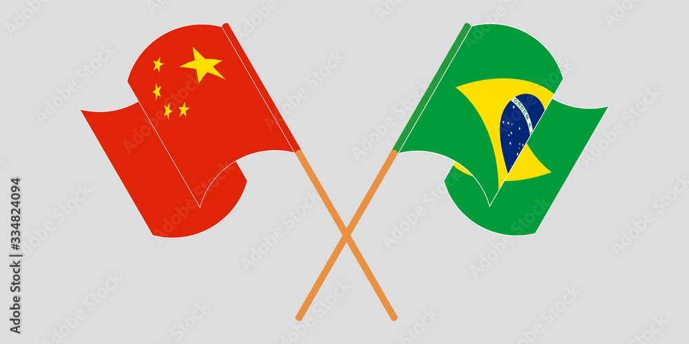 Crossed and waving flags of Brazil and China Crossed and waving flags of Brazil and China