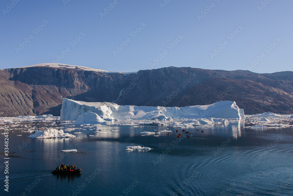 Landscape with iceberg in Greenland at summer time. Sunny weather.