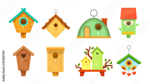 Decorative wooden spring bird houses. Colorful garden birdhouses for feeding birds. Wooden constructions to birds small buildings of planks with hole. Birdhouses set vector illustration.