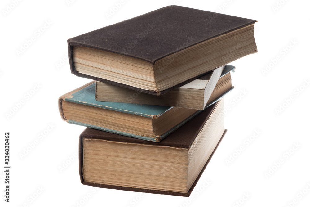 Stack of old books of diffrent sizes and colors, isolated on white Stack of old books of diffrent sizes and colors, isolated on white