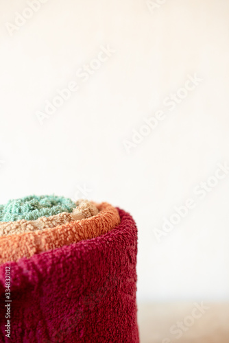 Colorful towels on background © Юлия Батаева