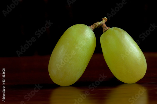 Two organic stoneless grapes. Spain photo