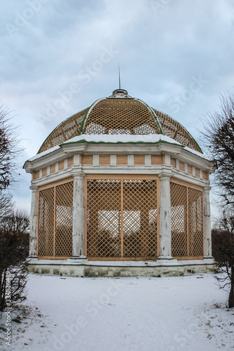 large aviary for birds on the territory of a historical estate in the park Kuskovo, Moscow