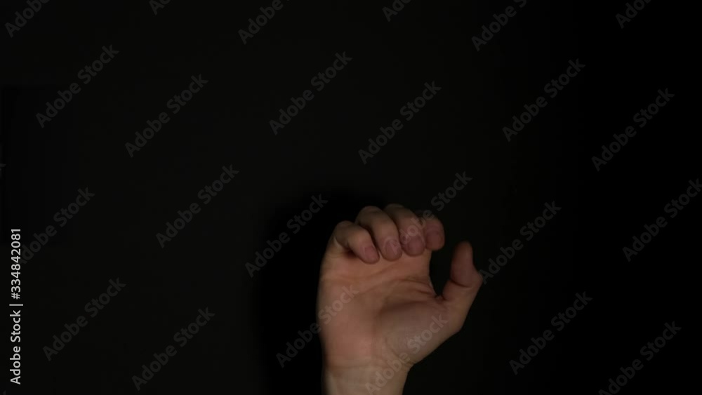 Human male palm isolated on black background. Close up. Human male palm isolated on black background. Close up.
