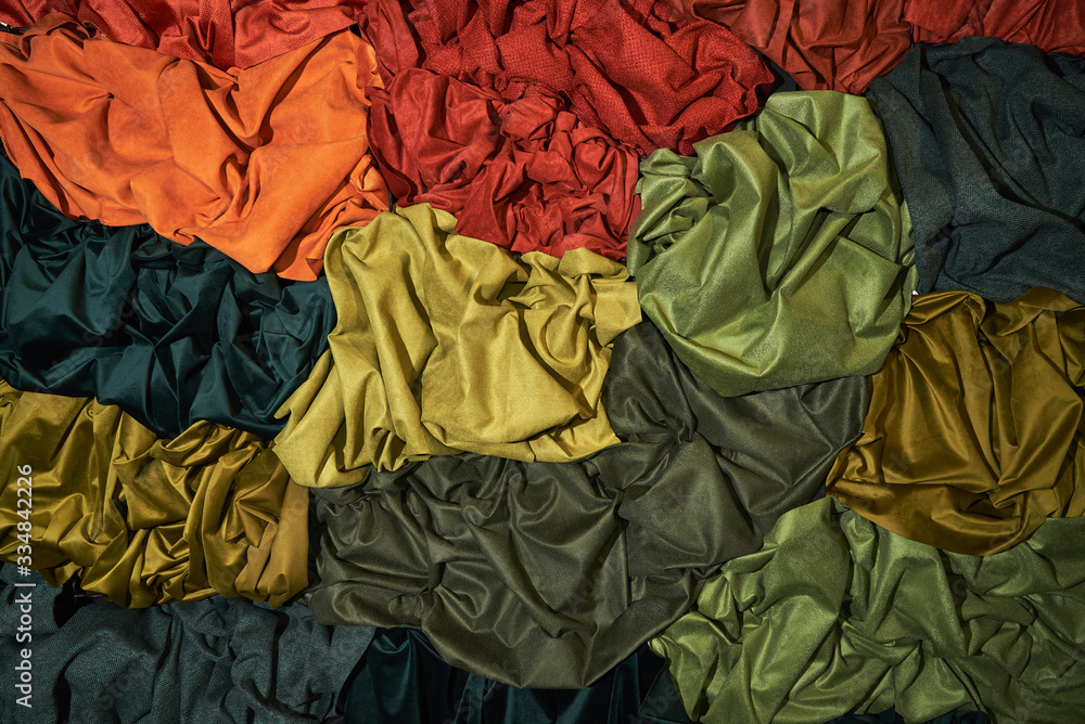 Obraz premium Abstract composition of plain fabrics of various colors. Background, abstraction
