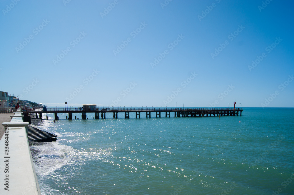 Beautiful white embankment on the Black Sea in Sochi, Loo. Beautiful white embankment on the Black Sea in Sochi, Loo.