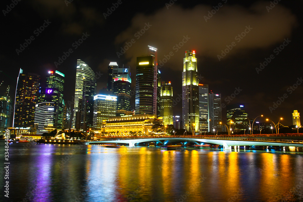 Night view of Singapore Business Center, water level view